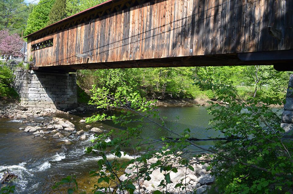 COvered bridge over a river