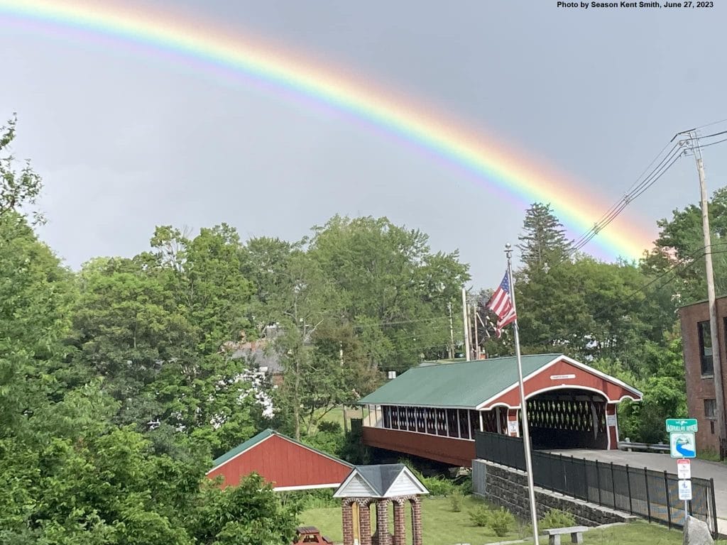 Covered Bridges with a rainbow over it